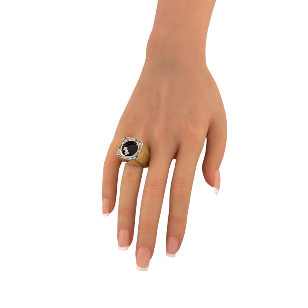 14K yellow gold diamond cocktail ring on hand, black square center and diamond halo