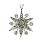 Back view of star diamond pendant in 18K white gold with prong-set stones