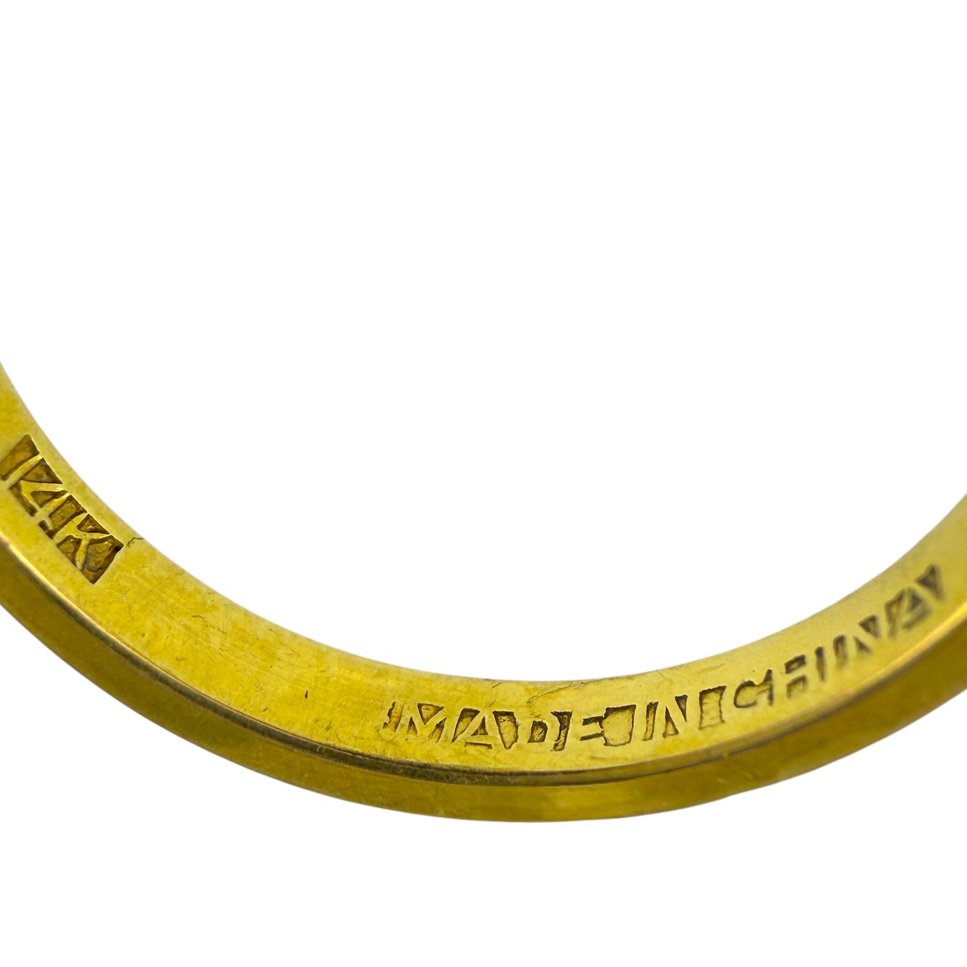 14k yellow gold ring band close-up with engraved pattern