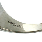 Inside band of white gold ring with stamped metal hallmark engraving