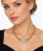 18K yellow gold diamond feather link necklace on a model