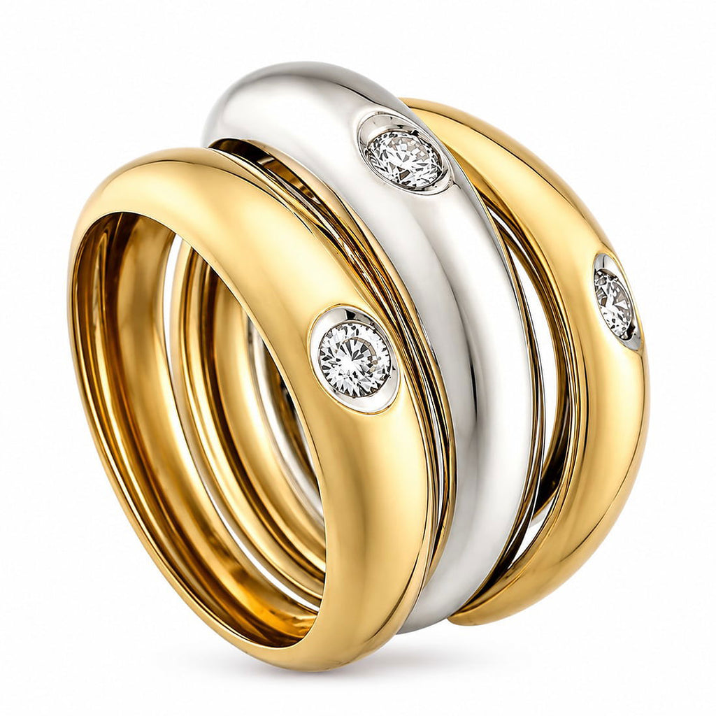 Stacked two-tone gold and white gold ring with round diamond stones