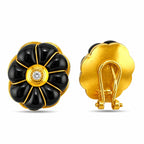 Sculpted onyx clip-on earring showing its gold back and clip fastening