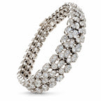 18K white gold diamond link bracelet with round bezel-set stones in flexible links