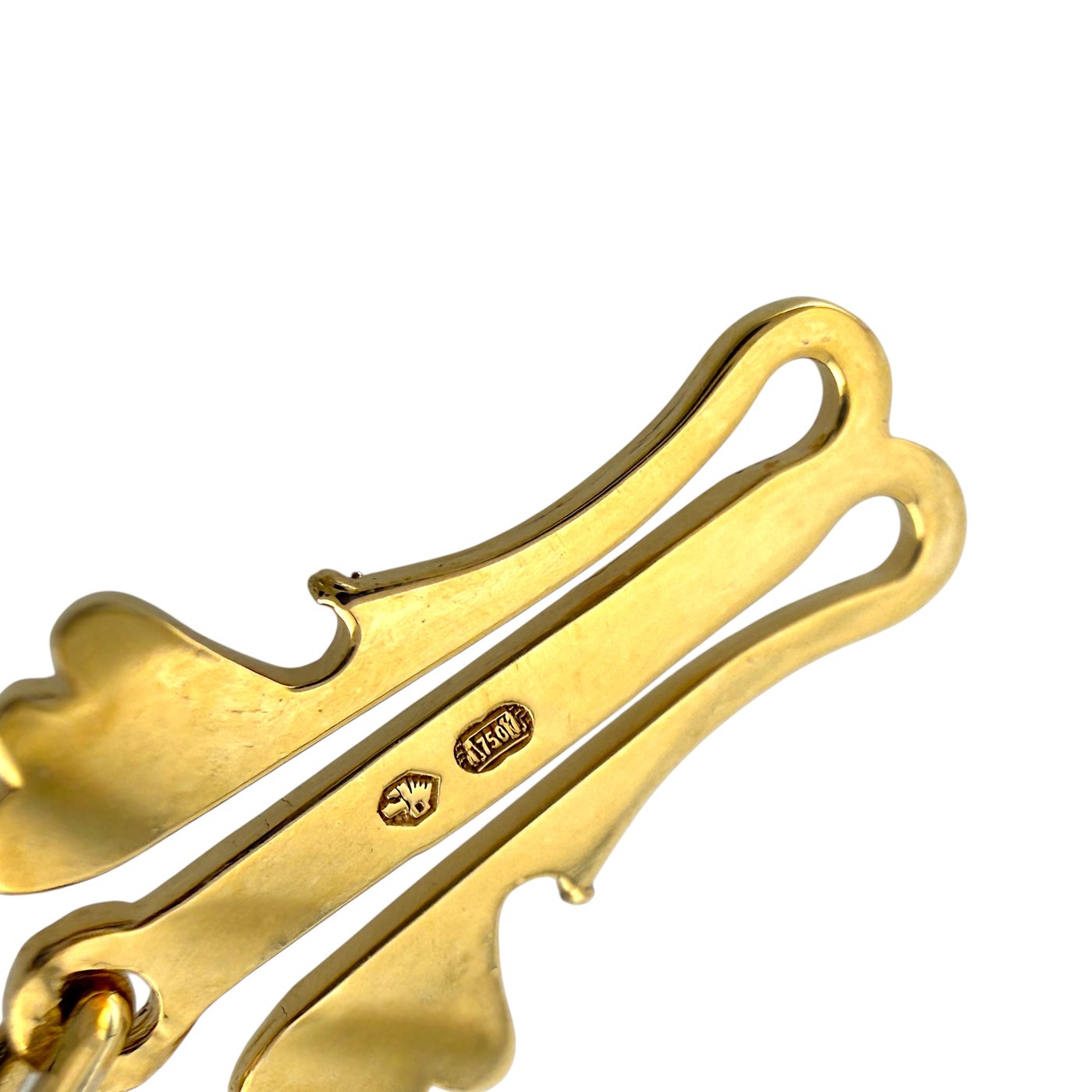 18k gold clasp back close-up with engraved stamps and polished metal finish