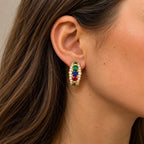Multicolor gemstone and diamond hoop earrings in 18K yellow gold, worn on ear