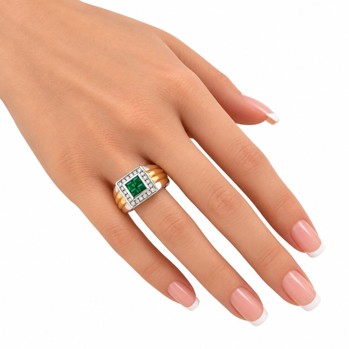 White gold emerald and diamond square ring worn on a hand