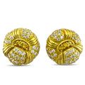 Gold stud earrings with yellow sapphire center and diamond halo clusters