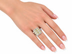Platinum diamond ring on hand, square cluster of yellow baguette and clear round stones