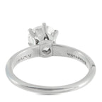 Platinum diamond solitaire ring side view with Tiffany & Co. engraving on band