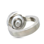 White gold floating diamond ring, side view of circular bezel and setting