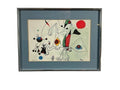 Framed signed art print with abstract figures and a large red circle