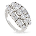 White gold diamond cluster ring with oval and round stones, prong-set halo