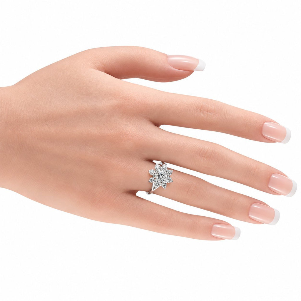 Diamond cluster ring on hand with pink nail polish, 14K white gold prong setting