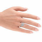 Diamond cluster ring on hand with pink nail polish, 14K white gold prong setting
