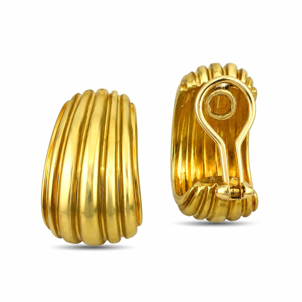 Gold clip-on earrings, showing the ribbed fronts and circular clip backs