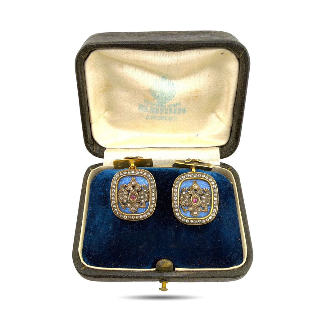Faberge 14K yellow gold cufflinks with blue enamel, ruby and diamond, in case