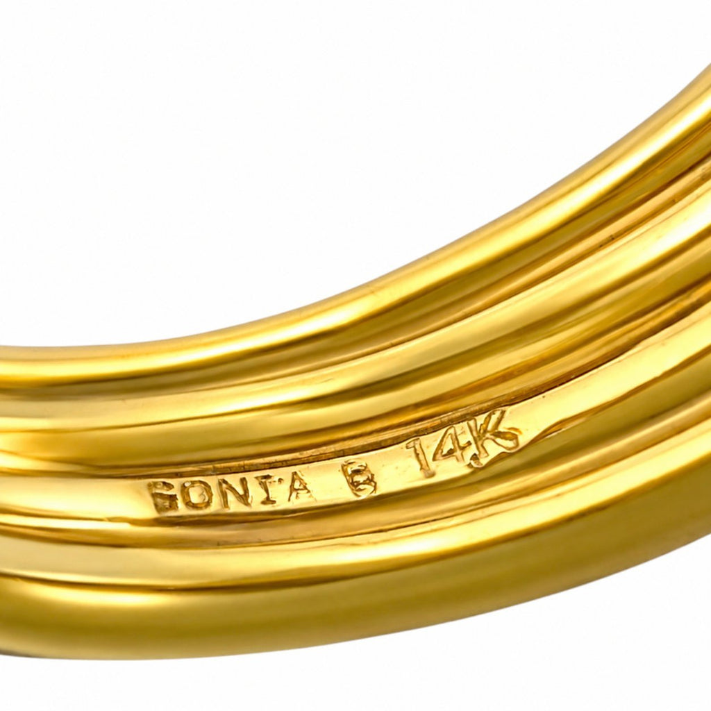 Sonia B. gold ring band close-up with an engraved maker's mark and 14K stamp