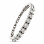 White gold tennis bracelet with square diamond link row, angled view