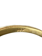14K yellow gold ring band close-up with interior hallmark marking