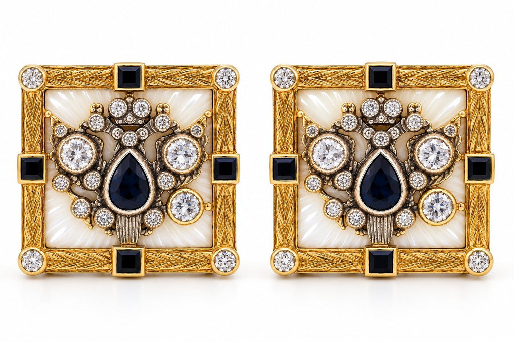 Square gold cufflinks with ornate crest, white enamel, blue stones, and round diamonds