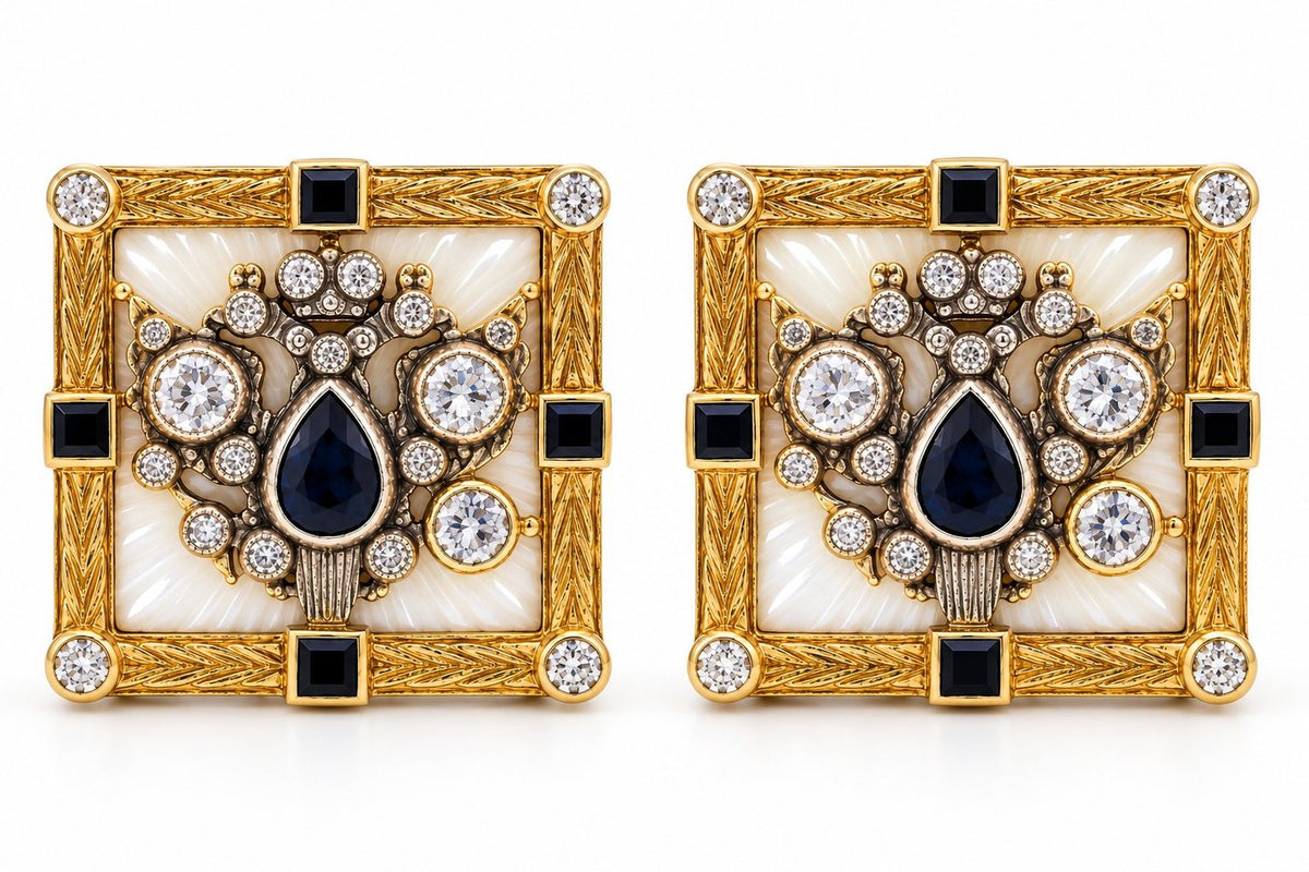Square gold cufflinks with ornate crest, white enamel, blue stones, and round diamonds