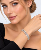 18K white gold diamond link bracelet on wrist, multi-row round stones