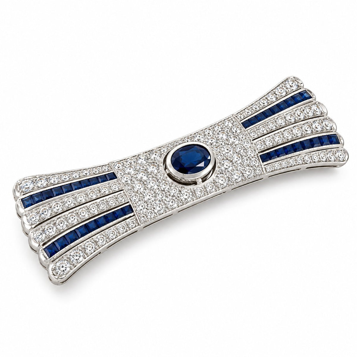 Diamond and sapphire bar brooch with blue oval center stone, arched frame and striped bands