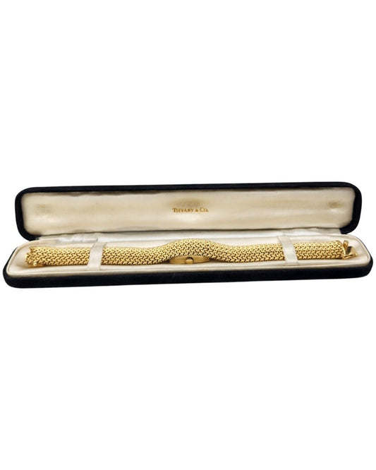 Tiffany & Co. 14K Gold Watch built into a gold bracelet (Covered Face Bracelet )
