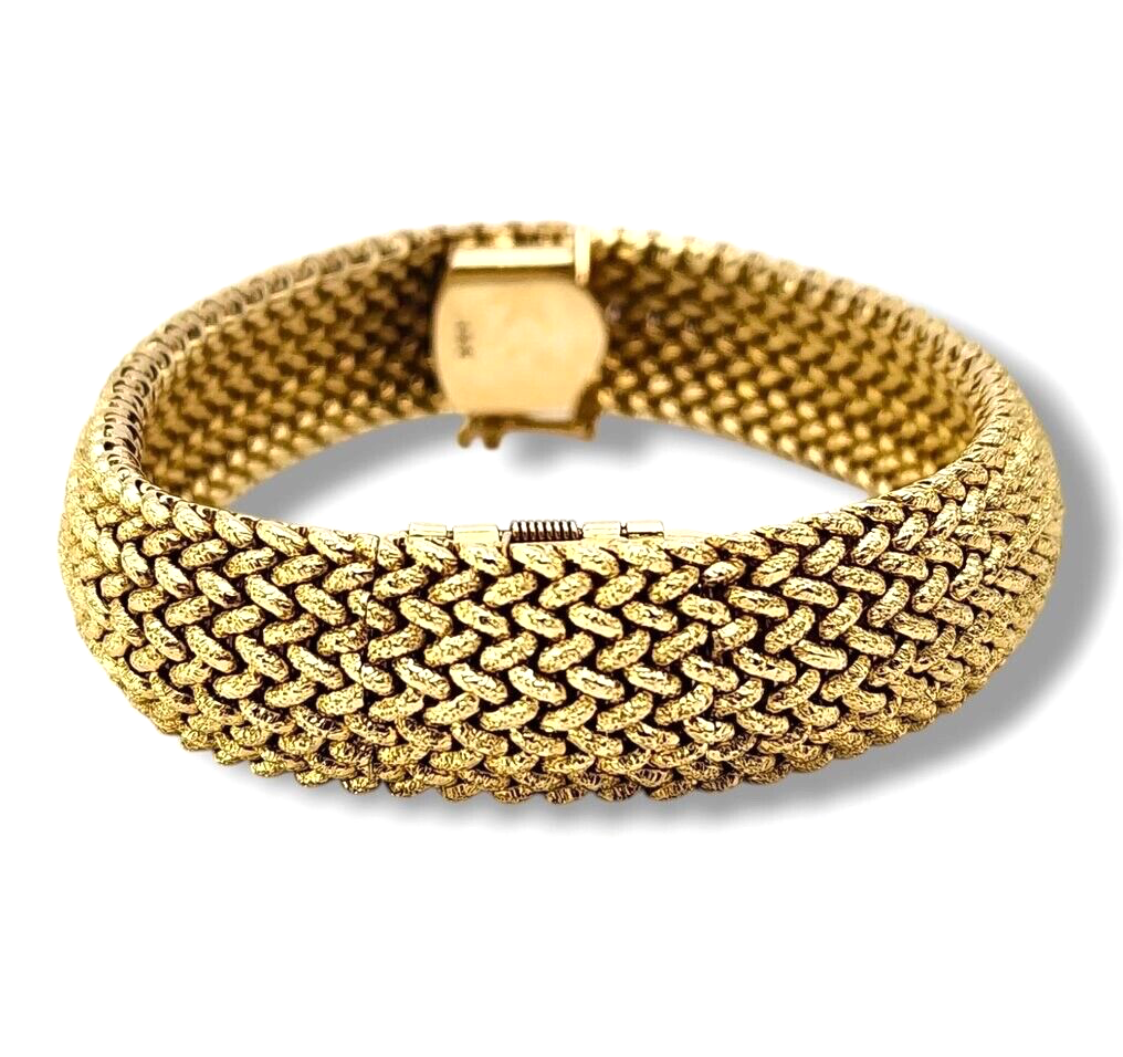 Tiffany & Co. 14K Gold Watch built into a gold bracelet (Covered Face Bracelet )