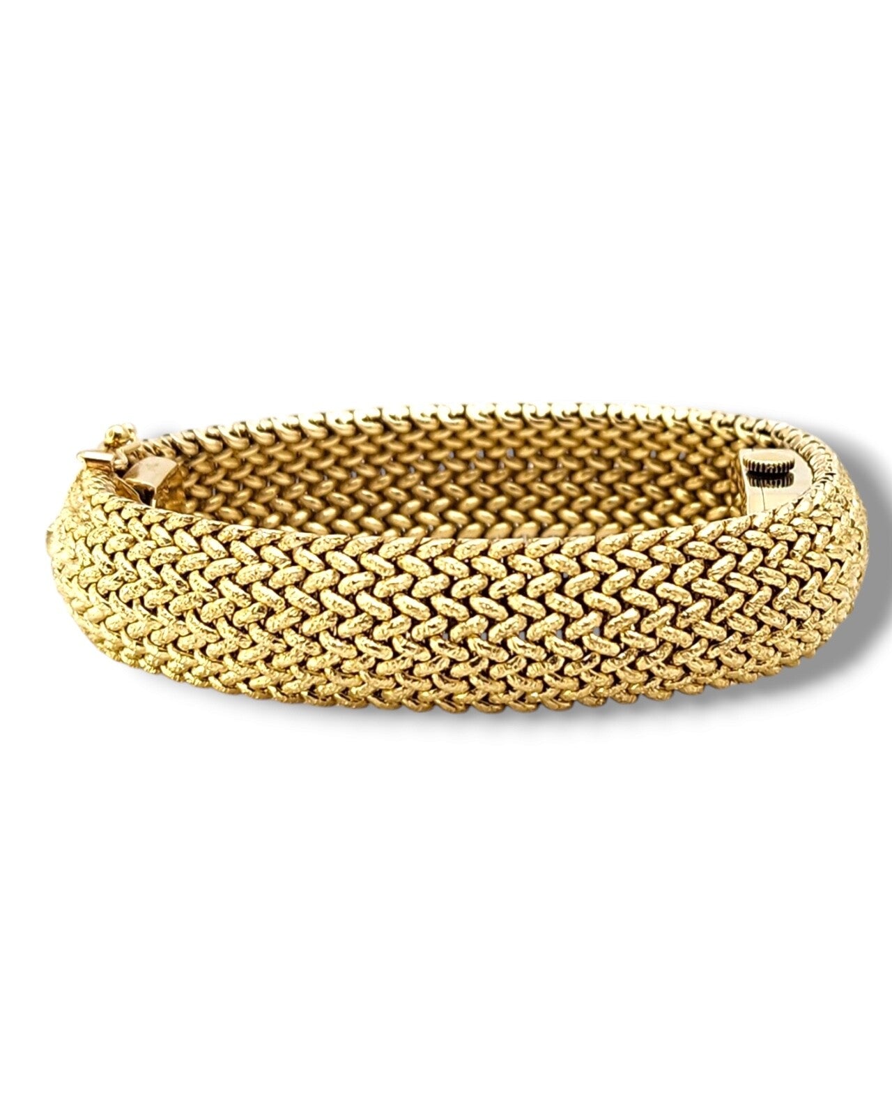 Tiffany & Co. 14K Gold Watch built into a gold bracelet (Covered Face Bracelet )