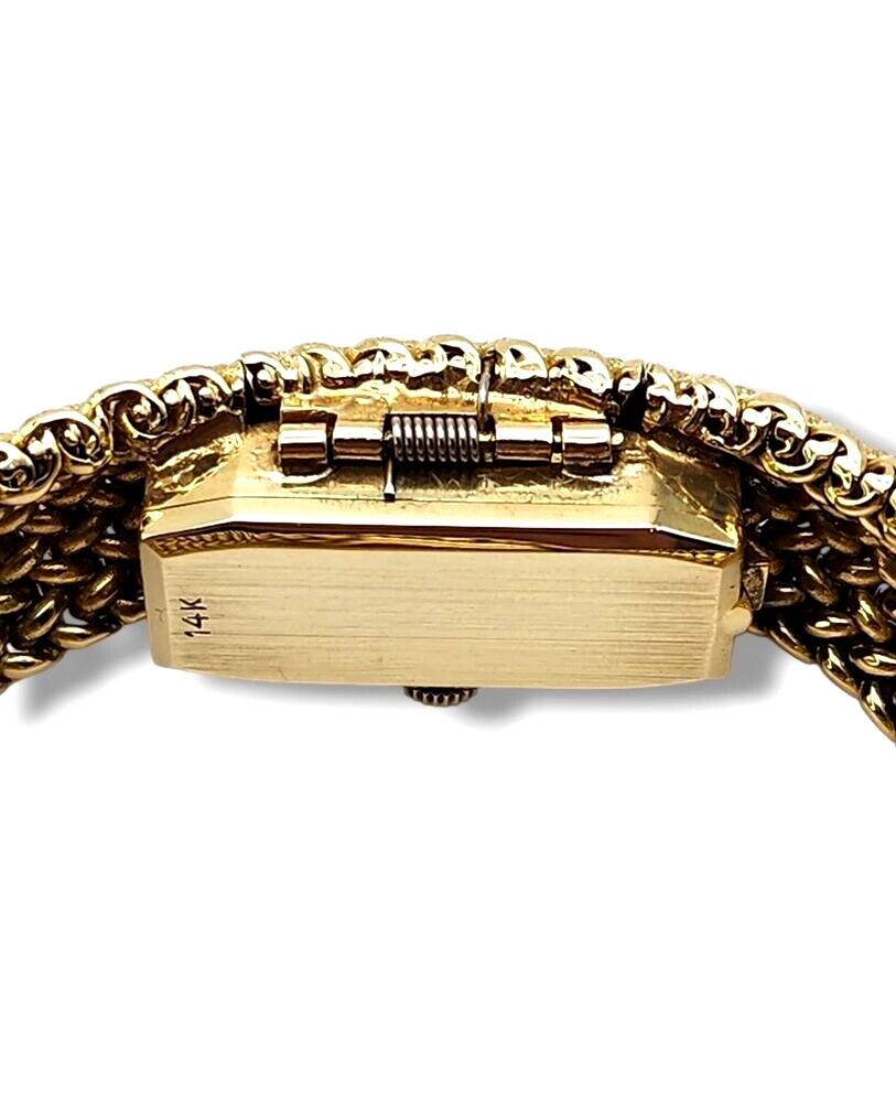Tiffany & Co. 14K Gold Watch built into a gold bracelet (Covered Face Bracelet )