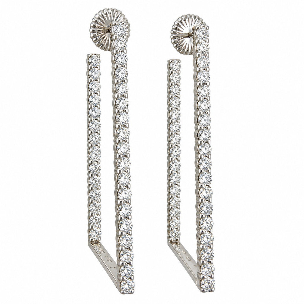 Platinum diamond drop earrings shown from the front, with rows of stones along open frames