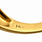 Inside view of 14K yellow gold ring band with engraved hallmark