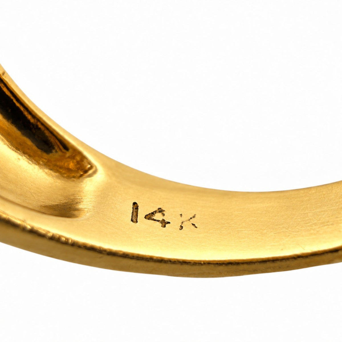 Inside view of 14K yellow gold ring band with engraved hallmark