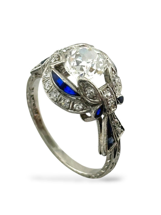 Platinum Ring with 1.00 Carat Diamond, Sapphires, and Accent Diamonds