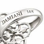 14K Damiani white gold band close-up showing “DAMIANI” and “14K”