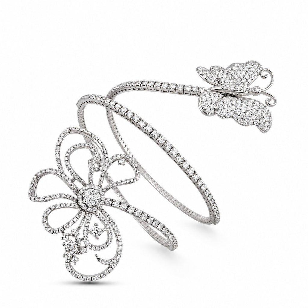 Flexible diamond bracelet with a butterfly and an openwork flower ornament