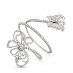 Flexible diamond bracelet with a butterfly and an openwork flower ornament