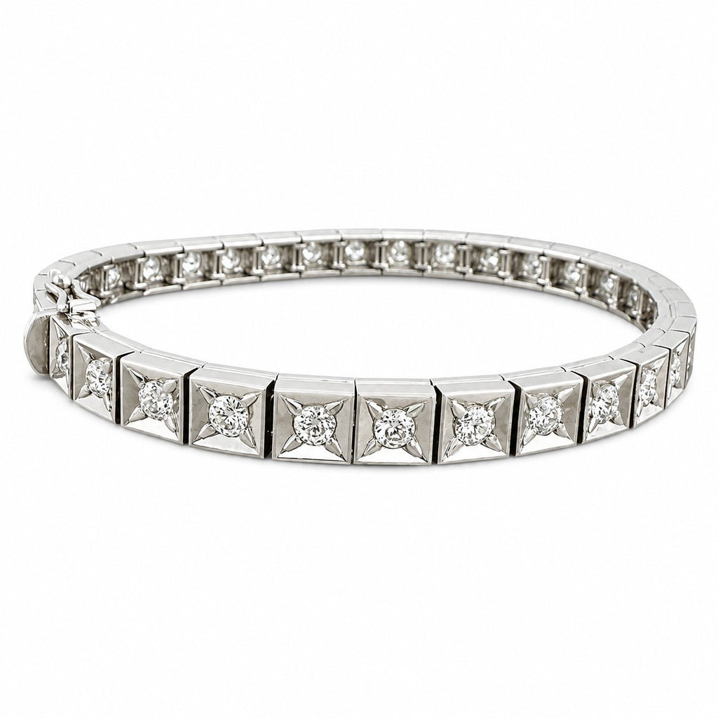 18K white gold tennis bracelet with a row of round diamonds in settings