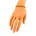 Roberto Coin yellow gold diamond openwork woven bracelet on hand