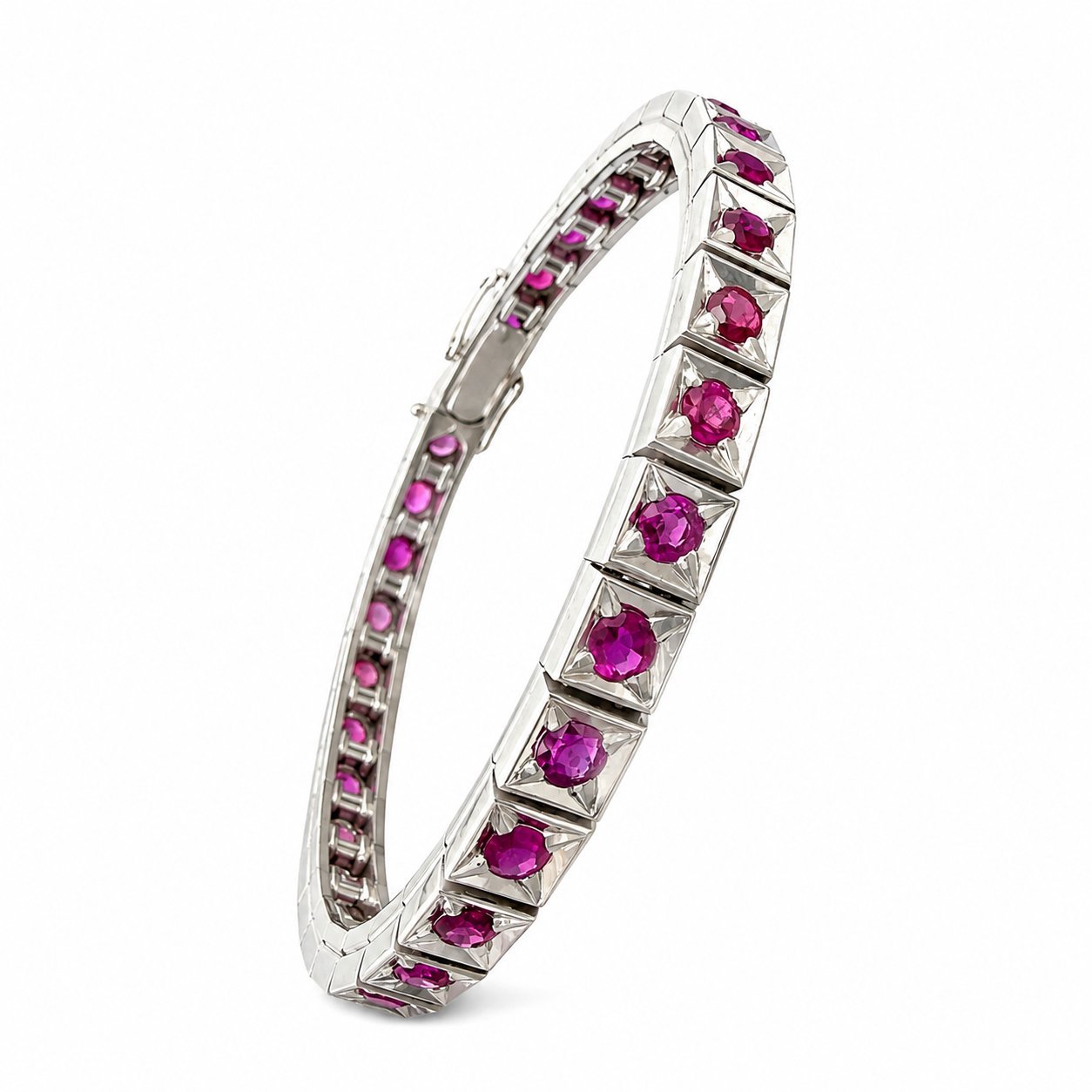 Platinum hinged tennis bracelet with row of ruby stones, curved profile