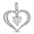 Platinum heart pendant with diamond center and pavé diamonds