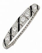 Art Deco 18K white gold diamond bracelet with black enamel and round diamonds