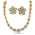 Sunflower diamond necklace with matching drop earrings in 18k yellow gold.