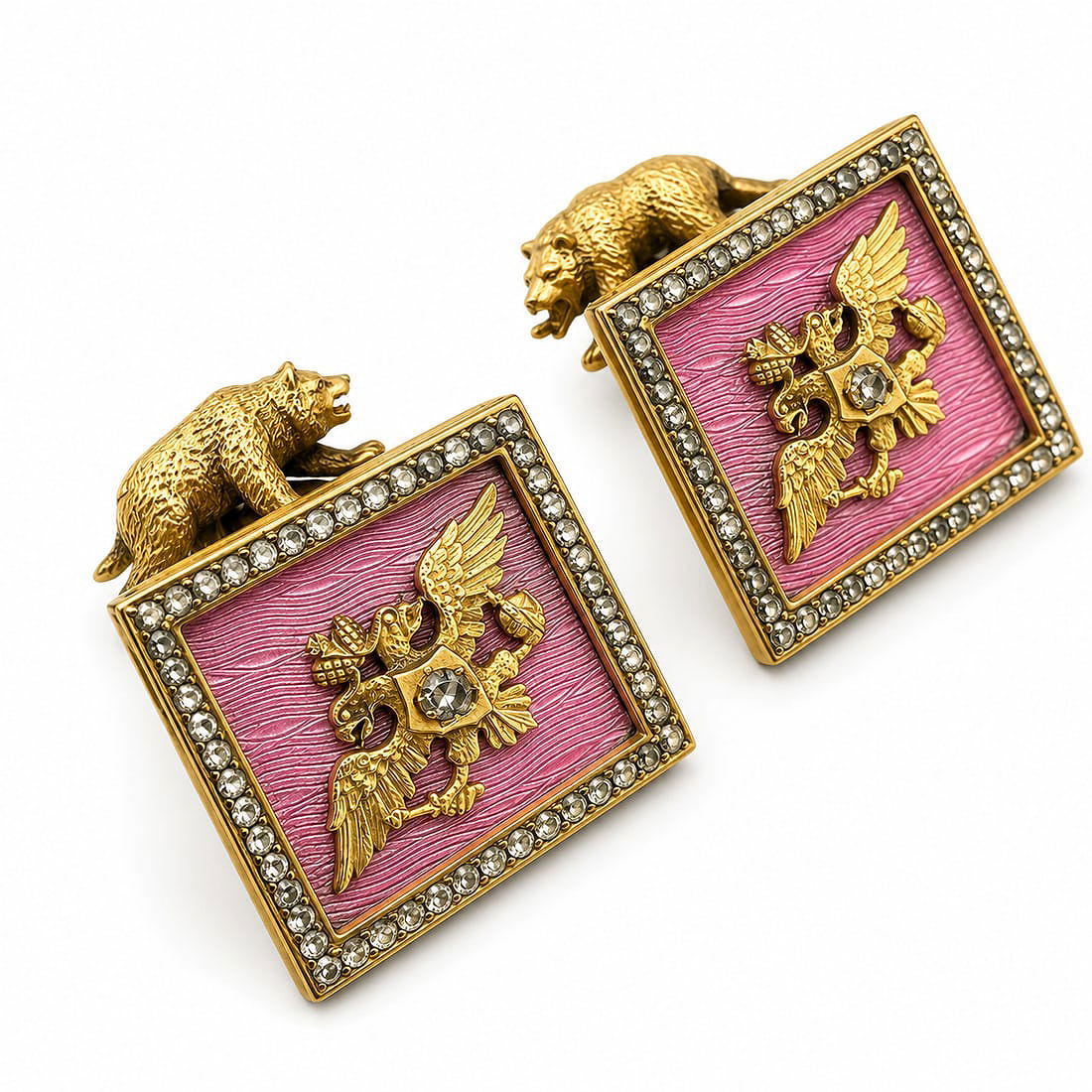 Gold-tone square enamel cufflinks with pink panel, diamond border and eagle motif