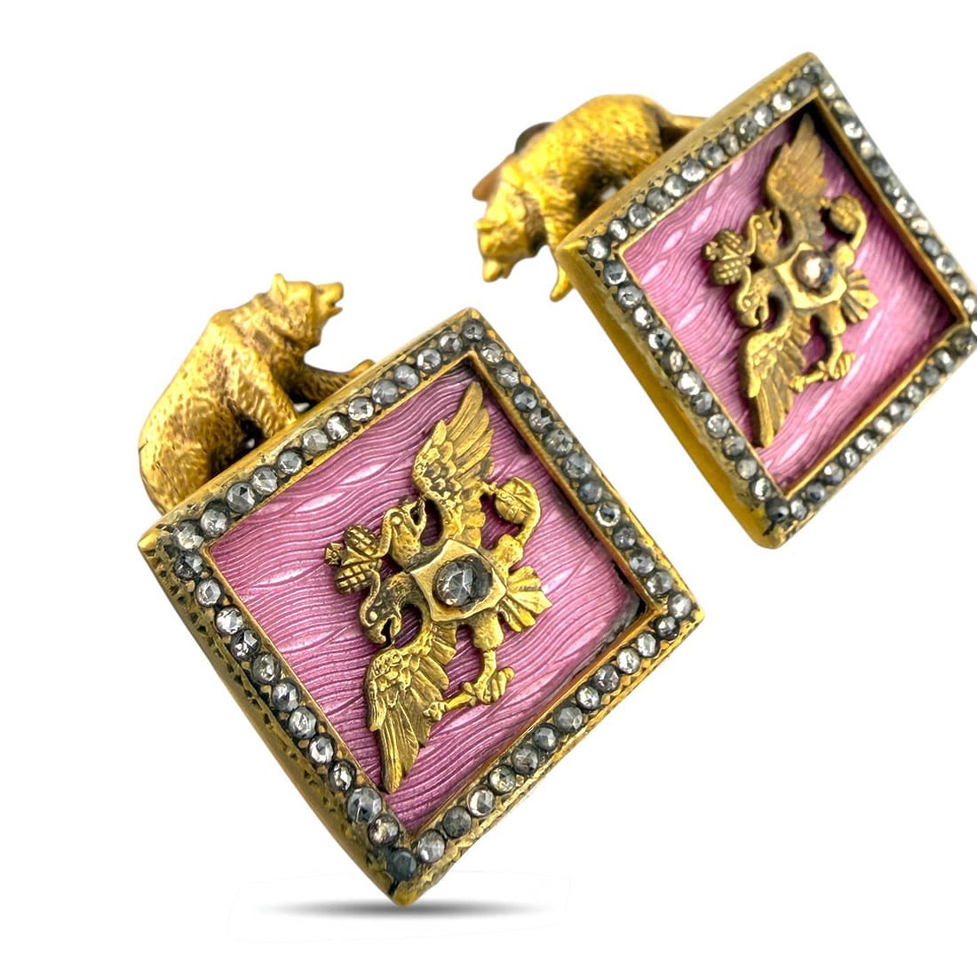 Square gold-tone enamel cufflinks with pink designs, diamond trim and animal finials