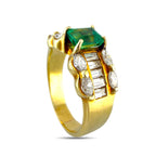 Yellow gold emerald and diamond ring, side view with square emerald and baguette stones