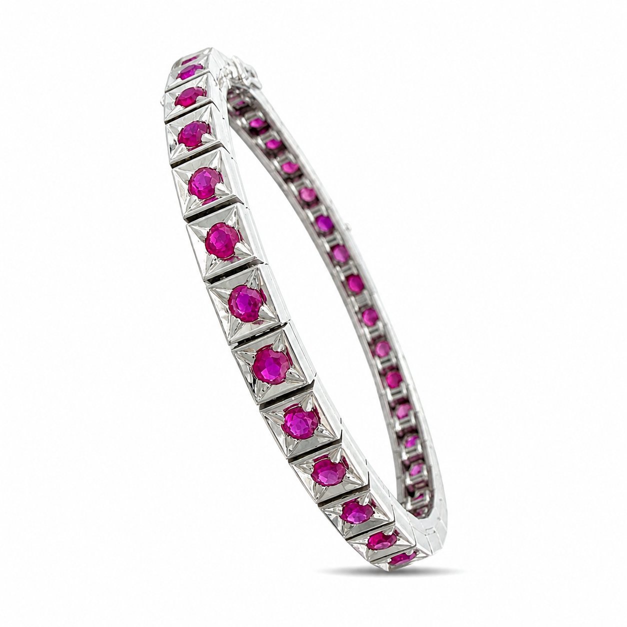 Platinum bracelet with faceted ruby stones in prong-set geometric sections