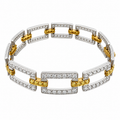 Diamond and yellow sapphire link bracelet in yellow gold and platinum